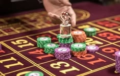 slotxoth casino presented on mobile device in Pakistan with slots and live games